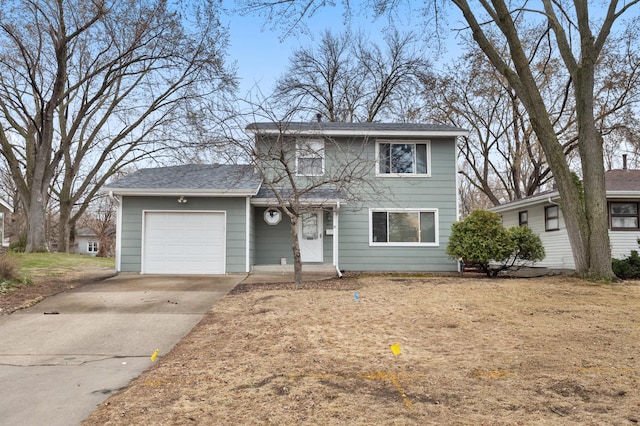 traditional home with concrete driveway and a garage