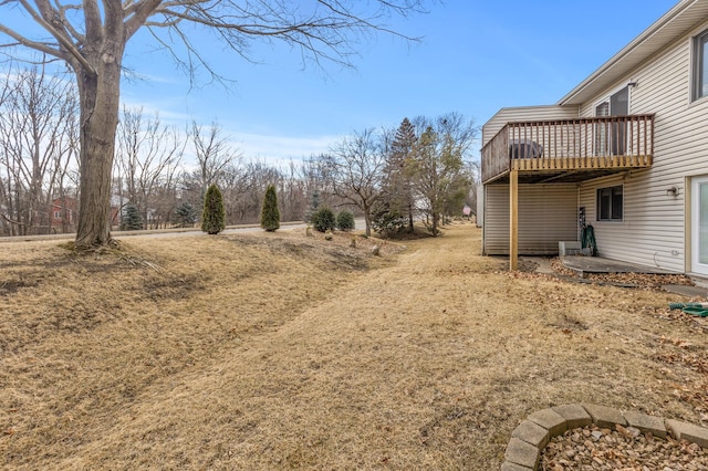 view of yard with a deck