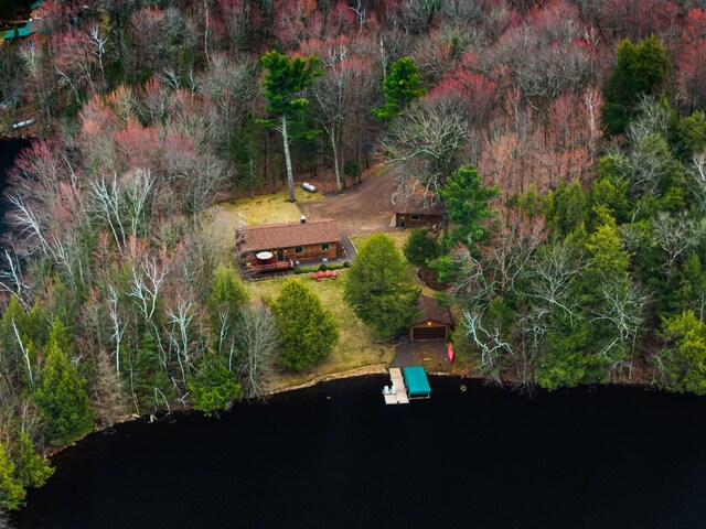 aerial view of property's location with a nearby body of water