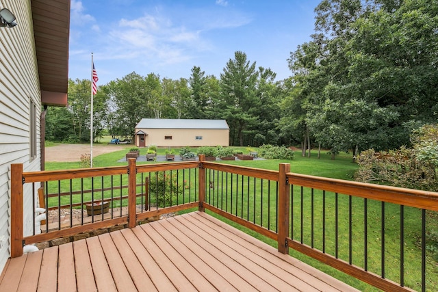 wooden terrace with a lawn