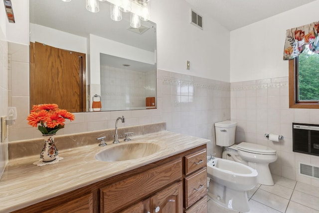 bathroom with visible vents, toilet, tile patterned floors, heating unit, and a bidet