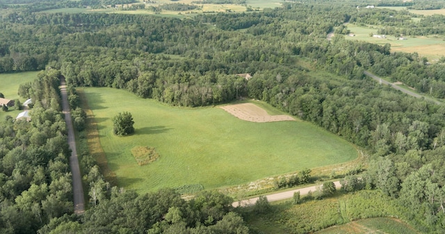 aerial view featuring a view of trees