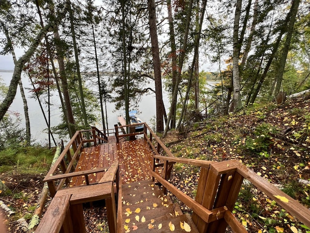 wooden terrace with a water view