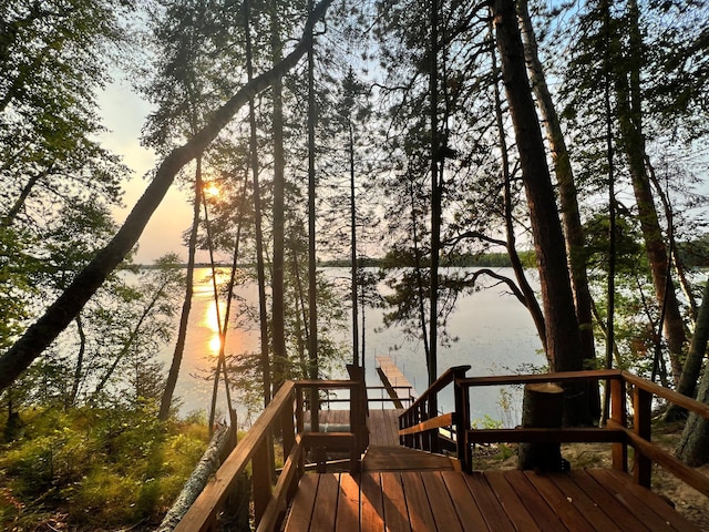 wooden deck with a water view