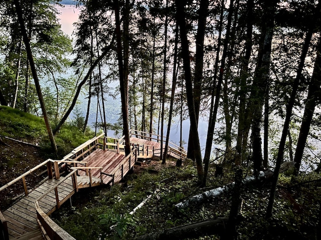 dock area with a deck with water view