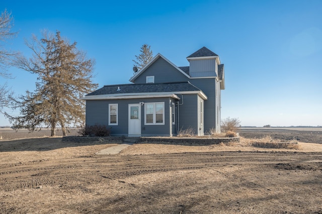 view of front facade featuring a shingled roof