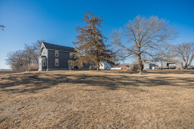 exterior space featuring a yard