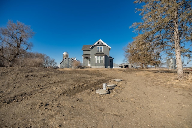 view of front facade with an outbuilding