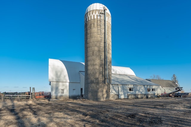 exterior space featuring a barn