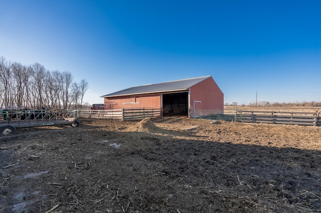 exterior space with a rural view and an exterior structure