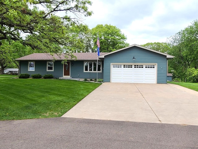 ranch-style home with a garage, driveway, and a front lawn