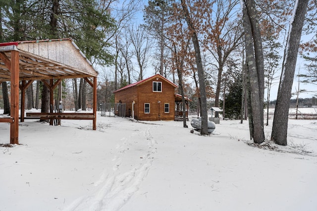 view of yard covered in snow