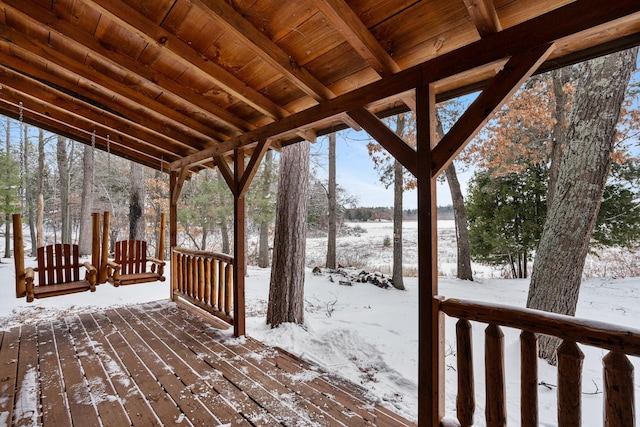 view of snow covered deck