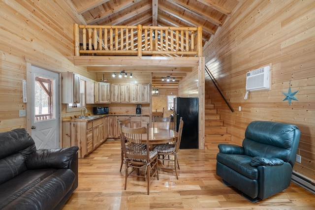 interior space with light wood-type flooring, wood ceiling, a wall unit AC, and wood walls