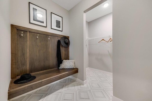 mudroom featuring baseboards