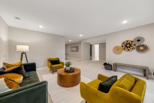 living room featuring baseboards, carpet floors, and recessed lighting