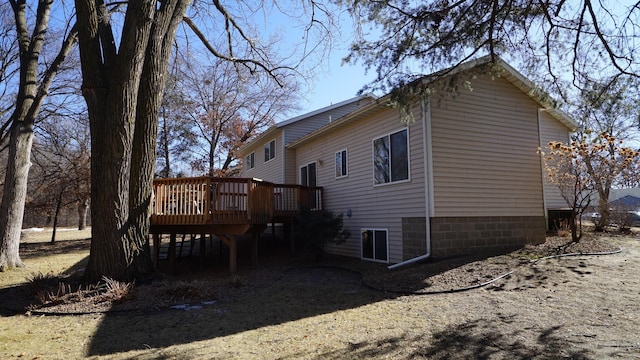 view of home's exterior with a deck