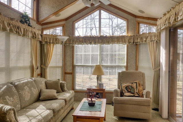 living room with light carpet and a towering ceiling