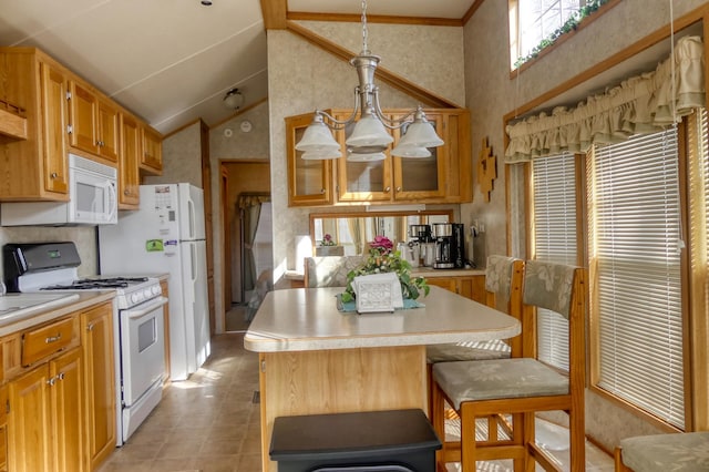 kitchen with high vaulted ceiling, a kitchen island, white appliances, an inviting chandelier, and light countertops