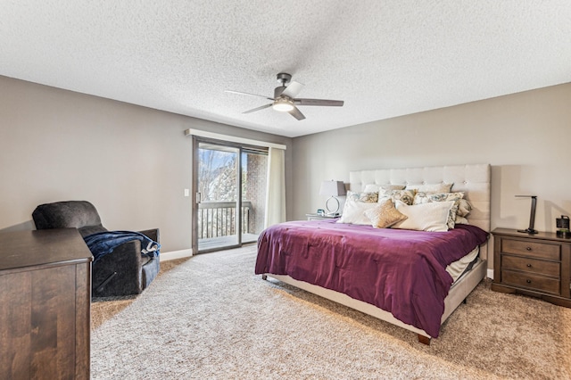 bedroom with access to exterior, carpet, baseboards, and a textured ceiling