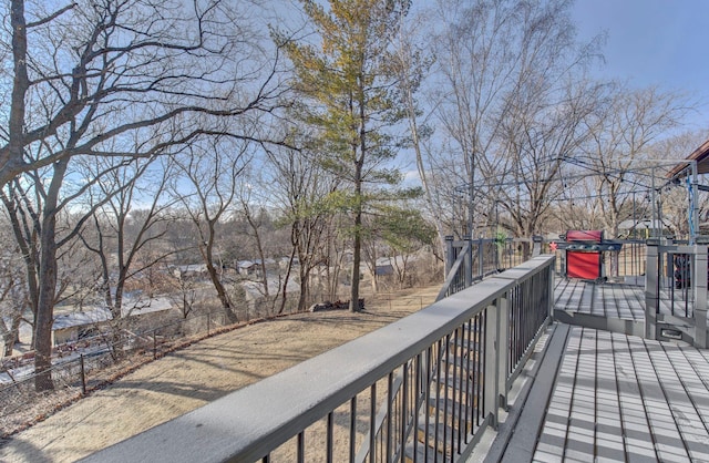 wooden deck featuring fence