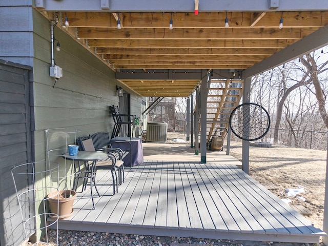 wooden terrace with central air condition unit