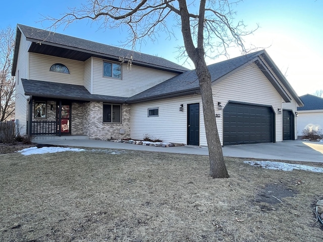 exterior space with covered porch, a garage, driveway, and roof with shingles