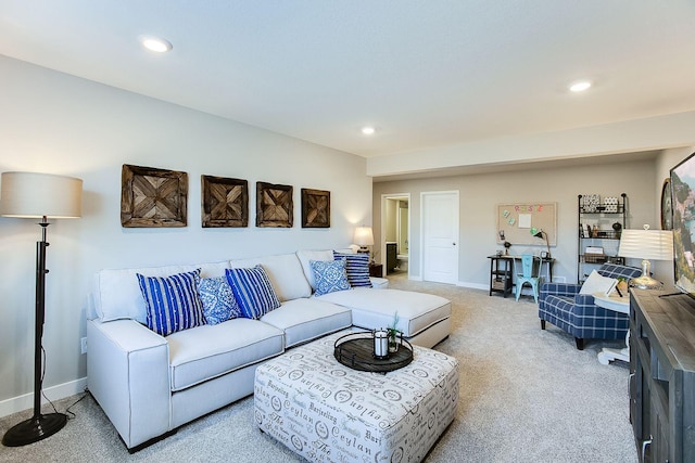 living area with baseboards, recessed lighting, and light colored carpet