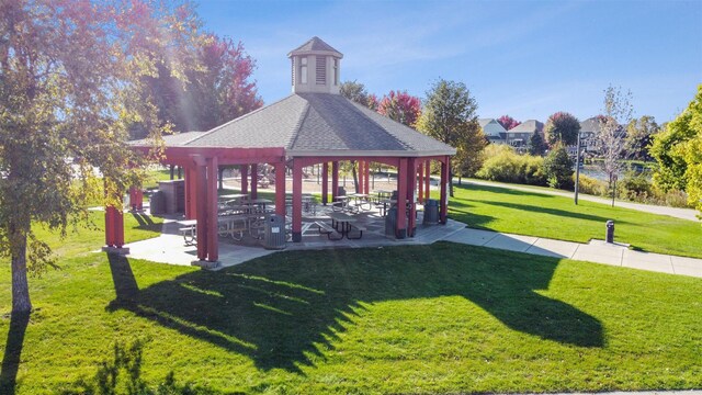 surrounding community featuring a lawn and a gazebo