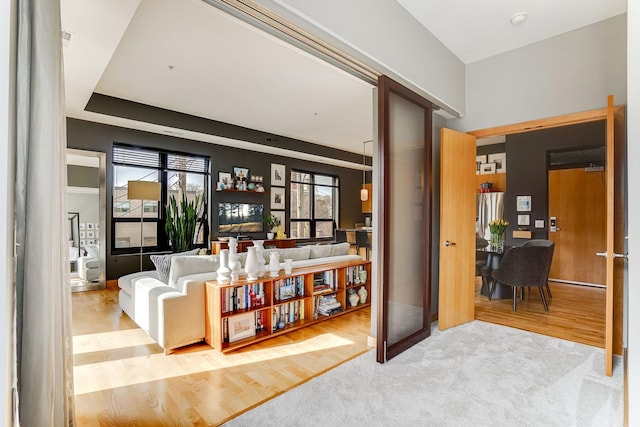 interior space featuring carpet and wood finished floors