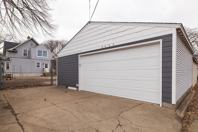 detached garage with fence