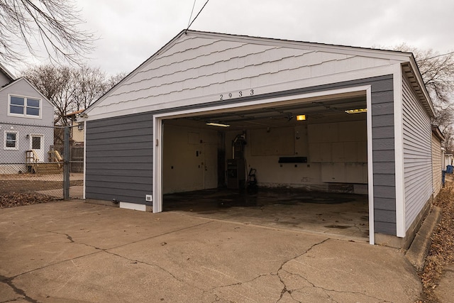 detached garage with fence