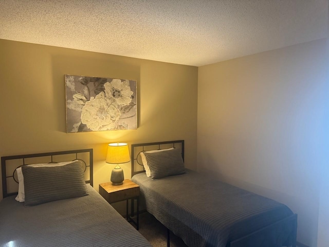 bedroom featuring a textured ceiling