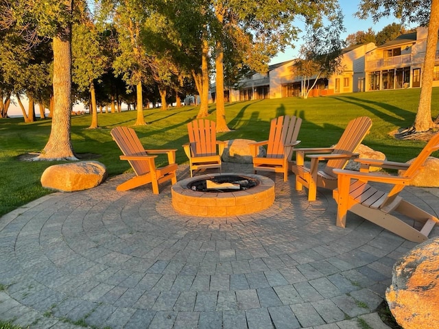 view of patio / terrace featuring an outdoor fire pit