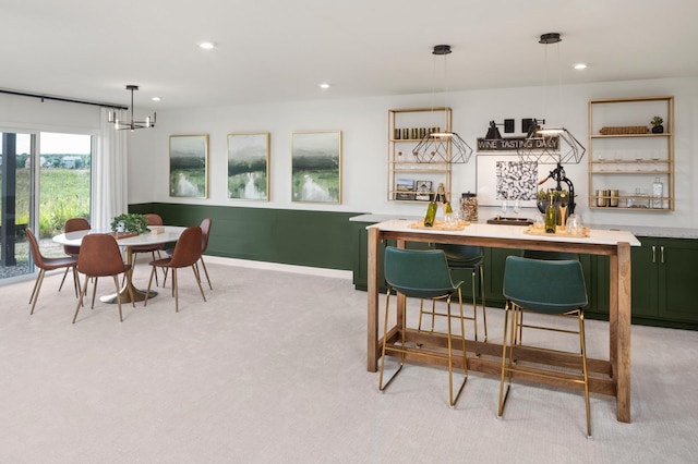 10720 Harbor Ln N, Maple Grove, MN 55369 - dining area with light colored carpet, recessed lighting, and a chandelier