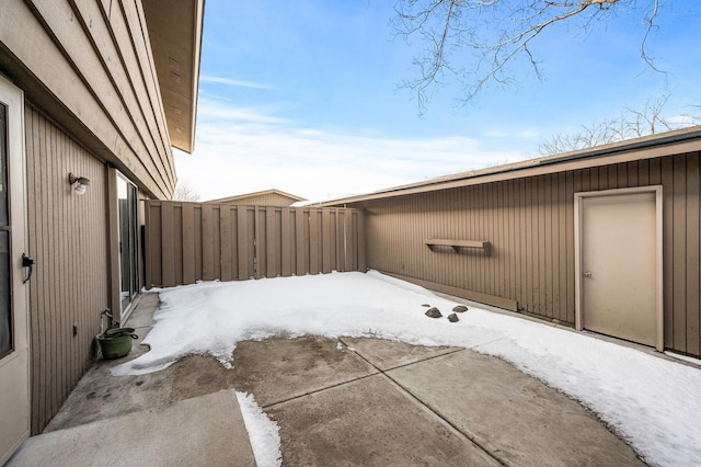 view of patio featuring fence