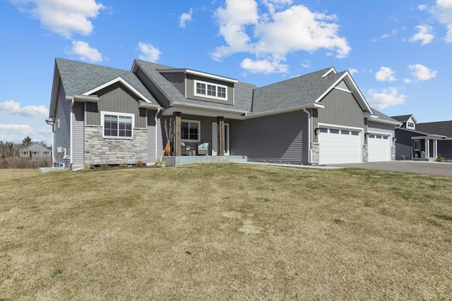 craftsman inspired home featuring a garage, a front yard, stone siding, and a porch