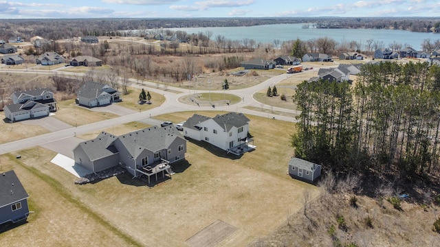 aerial view featuring a residential view and a water view