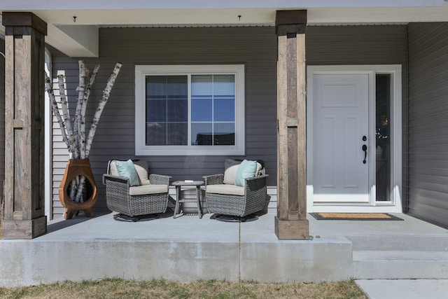 property entrance featuring covered porch