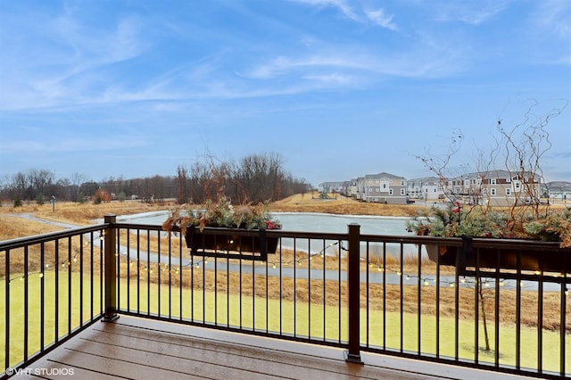 wooden deck with a residential view