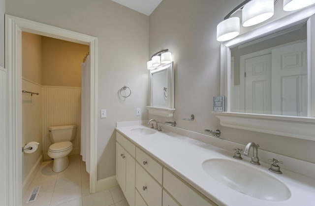 full bathroom featuring visible vents, a sink, toilet, and tile patterned floors