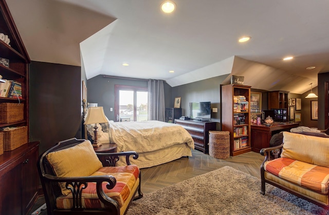 bedroom with lofted ceiling and recessed lighting