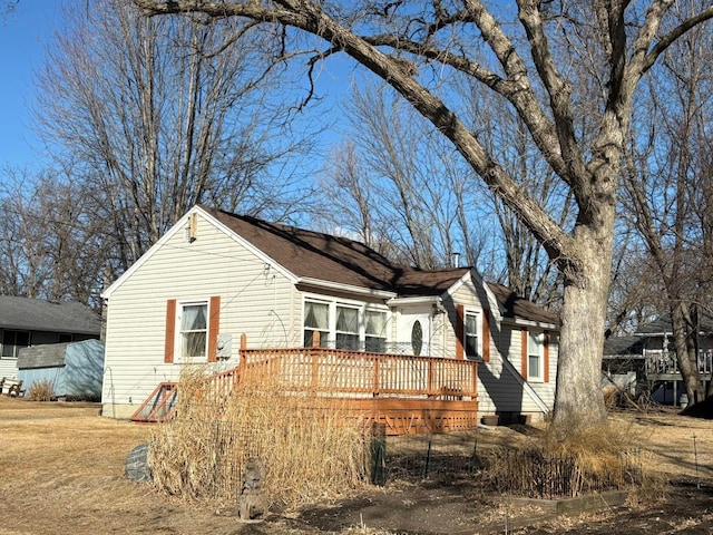 view of front of home with a wooden deck