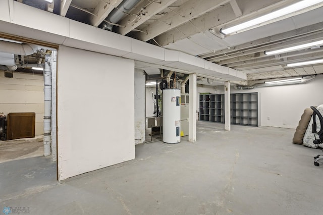 unfinished basement with electric water heater