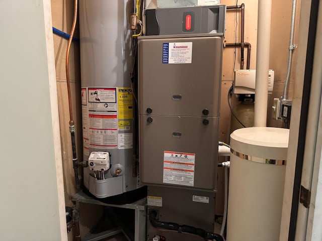 utilities with gas water heater and heating unit