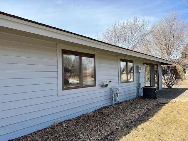 view of property exterior with cooling unit