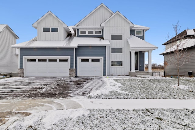 view of front of property featuring a garage and board and batten siding