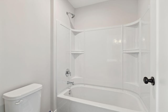 full bathroom with shower / bath combination and toilet