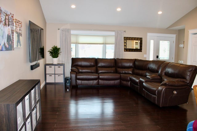 living room with lofted ceiling, hardwood / wood-style floors, and recessed lighting