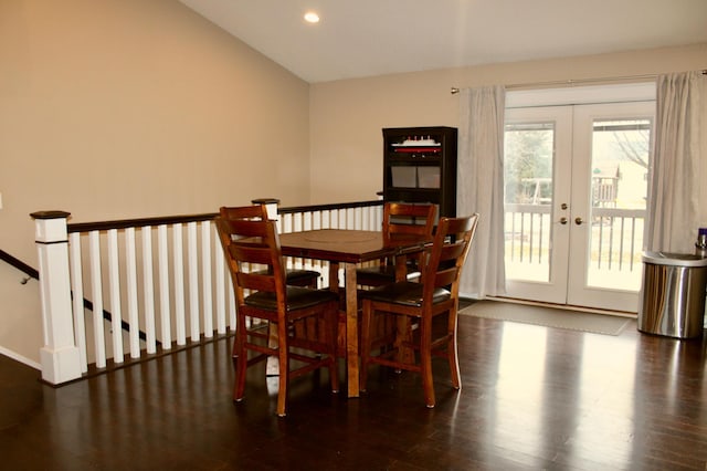 dining area featuring recessed lighting, french doors, lofted ceiling, and wood finished floors